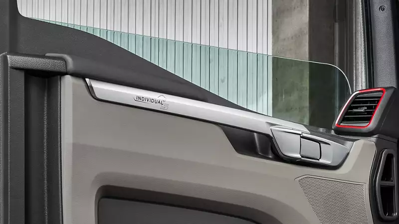 Chrome door moulding and plastic door interior cladding